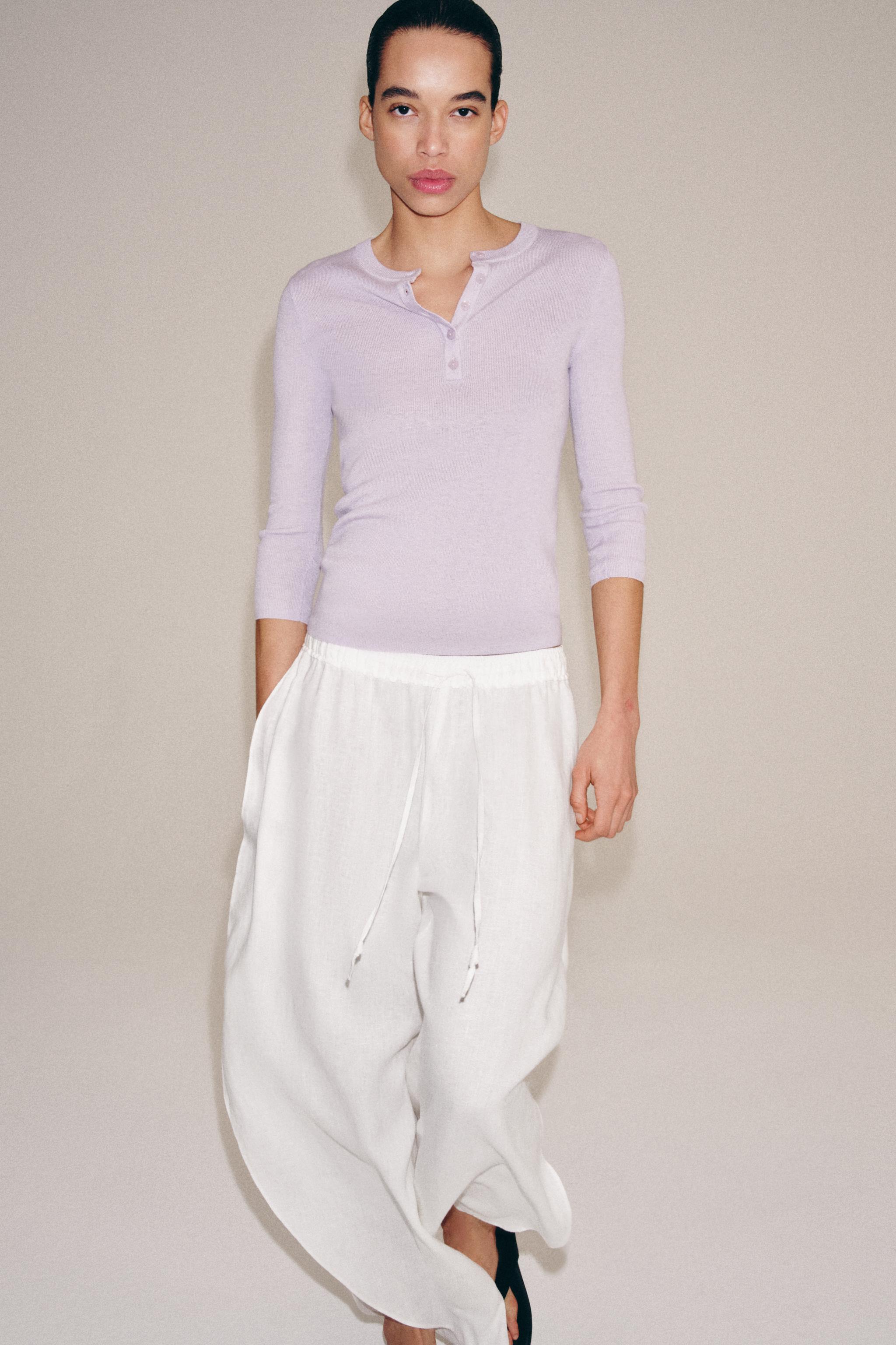 PULL EN MAILLE À BOUTONS